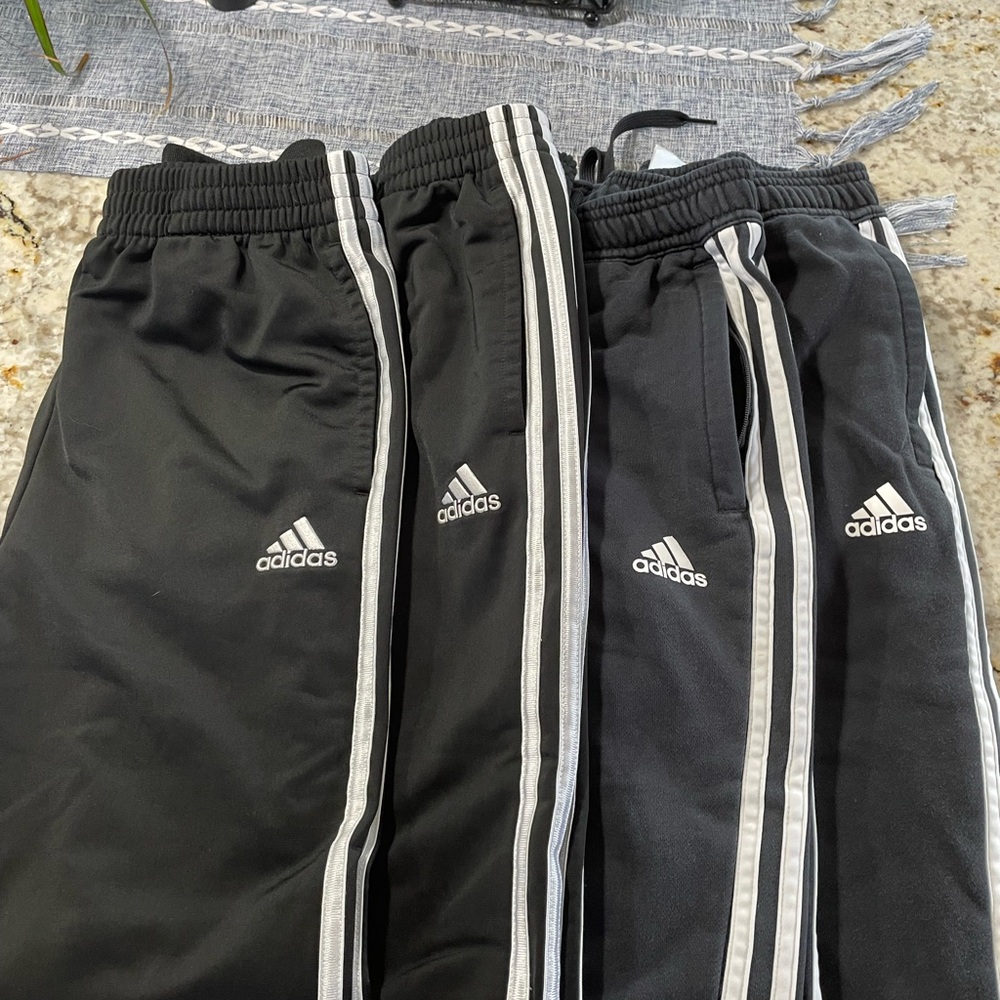 Adidas Black Sweatpants with Three-Stripe Design